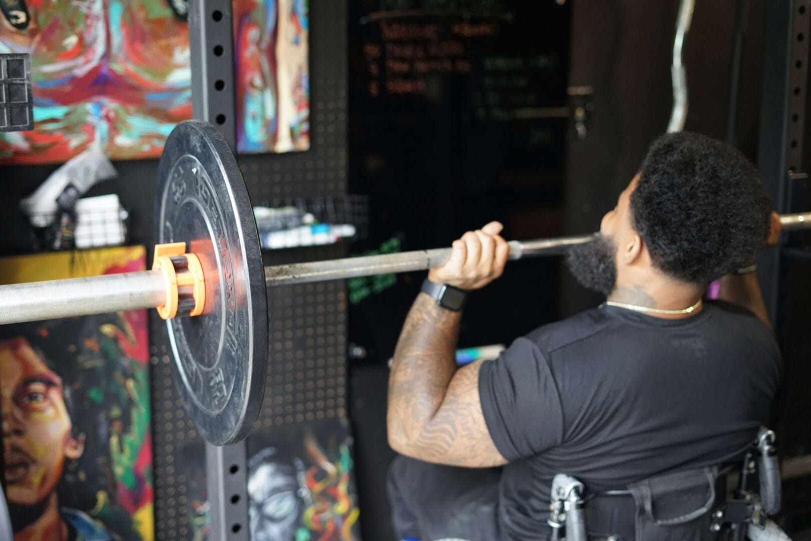 A man lifting a weight bar